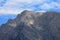 Closeup of cloudy Grimming Peak, Dachstein Mountains Dachsteingebirge, Alps, Styria Steiermark, Austria Ã–sterreich