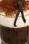 Closeup on coffee with milk froth cocoa powder wit