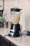 Closeup of coffee smoothie maker shaker for preparing cold iced coffee