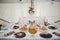 Closeup of cold drinks, sweets, and snacks on the table during a wedding party