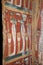 Closeup of colored decoration on an old wooden sarcophagus from ancient egypt.