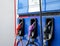 Closeup colorful Hand refilling the car with fuel at the refuel station,on white background