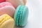 Closeup of colorful pastel macaroons. Sweet macarons.