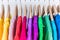 Closeup of colorful t-shirts on clothing rack