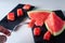 Closeup of a composition of fresh fruit of the summer, watermelon on white background with slate. Mediterranean diet with varied