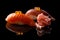 Closeup composition of two fresh salmon sashimi sushi with caviar