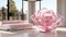 A Closeup of a Contemporary Rose Pink Glass Sculpture Showcased in Front of a Stunning, Modern Living Room