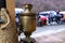 Closeup copper samovar on a blurred background