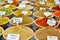 Closeup of a counter with a big variety of spices on Jerusalem market in Israel.