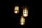 Closeup of craftsman outdoor and indoor luxury hanging light for interior and exterior illumination at night.