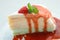 Closeup crape cake wth strawberry sauce