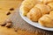 Closeup croissant with almond on wooden table. breakfast concept