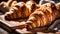 Closeup of Croissants on a wooden cutting board