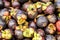 Closeup and crop pile of mangosteen