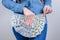 Closeup cropped photo of she her lady closing covering intimate zone using holding pile of money wearing like skirt clothes