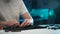 Closeup cropped shot of unrecognizable man assembling disassembled keyboard after cleaning from dirt. PC male user