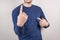 Closeup cropped view photo of confident smart clever intelligent intellectual trader showing forefinger to himself isolated grey