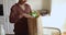 Closeup cropped view woman unpack shopping bag with vegetables