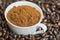 Closeup of a cup filled with coffee powders