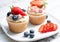 Closeup Cupcakes  with blueberry and strawberry on white plate