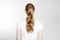 Closeup curly wavy imperfect pony tail back view isolated on white background. Quick easy Not ideal realistic Hair-styles for long