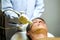 Closeup a customer having therapy to stimulate facial skin and facial ultrasonic skincare treatment