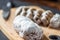 Closeup Cut Mini Marzipan Stollen with Knife on Wooden Board