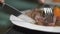 Closeup cutlery with tenderloin steak dish in restaurant