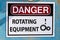 Closeup of a Danger Rotating Equipment sign