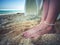 Closeup Decorated Bridal Foots of Beautiful bride at beach, Bali.