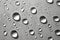 Closeup of deep droplets on surface banner in grey scale with ce