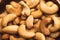 Closeup of delicious cashew nuts background