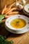 Closeup of delicious home made broth on old wooden table