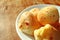 Closeup Delicious Pao de Queijo, Traditional Brazilian Cheese Breads Served on Wooden Table