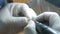 Closeup of a dental technician making of denture in a dental lab