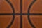 Closeup detail of basketball ball texture background