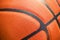 Closeup detail of basketball ball texture background