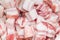 Closeup detail of fresh raw pork meat or bacon cuts prepared for roasting pork crackling