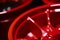 Closeup detail of Red Aluminum car wheel. Neural network AI generated