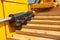 Closeup detailed shot of a track and hydraulic pump of a bulldozer