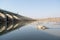 Closeup of died Fishes in a dried up empty reservoir or dam due to a summer heatwave, low rainfall, pollution and drought in north