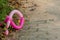 Closeup of discarded pink balloon