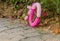 Closeup of discarded pink balloon