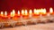 Closeup of Diwali diya or oil lamp over red background