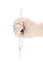 Closeup of a doctor with gloves on holding a needle downwards on a white background