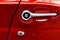 Closeup door handle of red  Thunderbird retro car