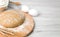 Closeup dough and ingredients for its preparation: flour and eggs. Baking bread or biscuits. Copy space