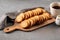 Closeup on dried bread croutons on wooden board