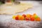 Closeup of dried fruits and dough on the table