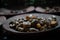 Closeup dried galangal on the clay plate